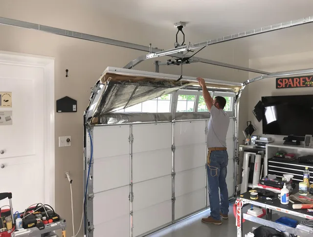 Garage door section replacement by Westport Garage Door Repair in Westport