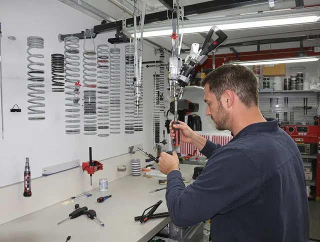 Westport Garage Door Repair safety certified technician performing precision spring replacement in Westport